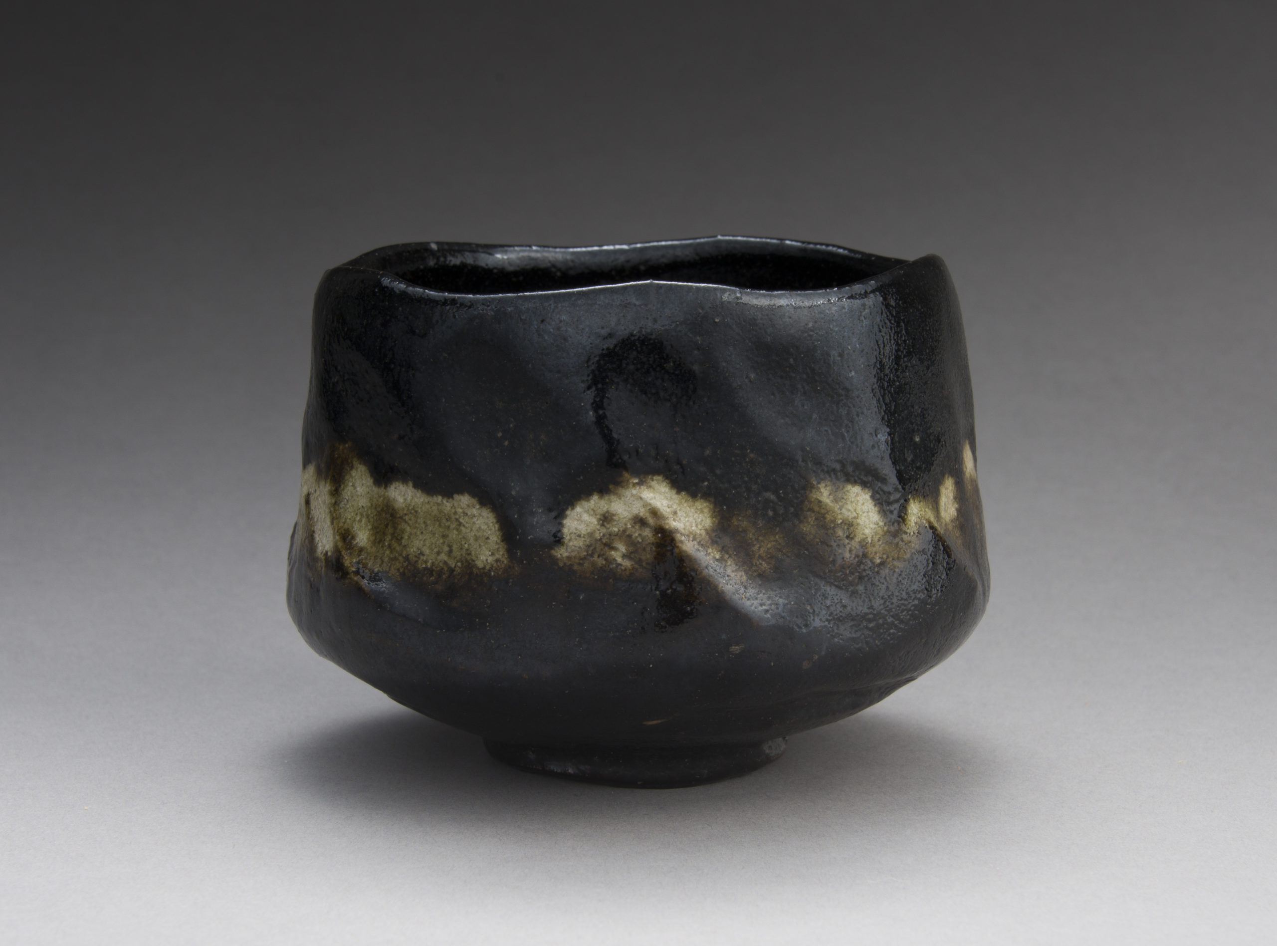 A Black Raku Tea Bowl by “Rakuen”