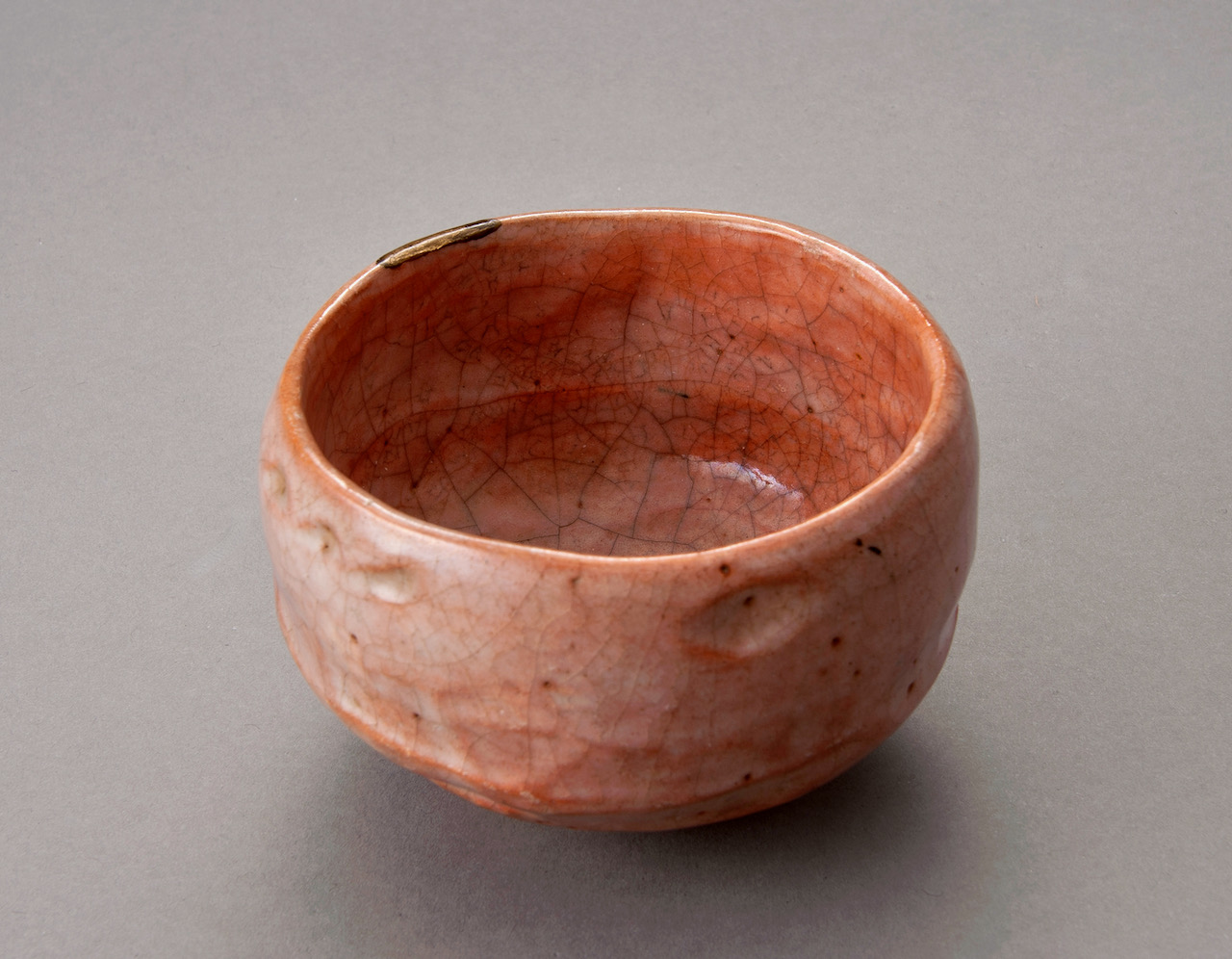 A Red Raku Tea Bowl by Famed Potter Ichigen (1662 – 1722)