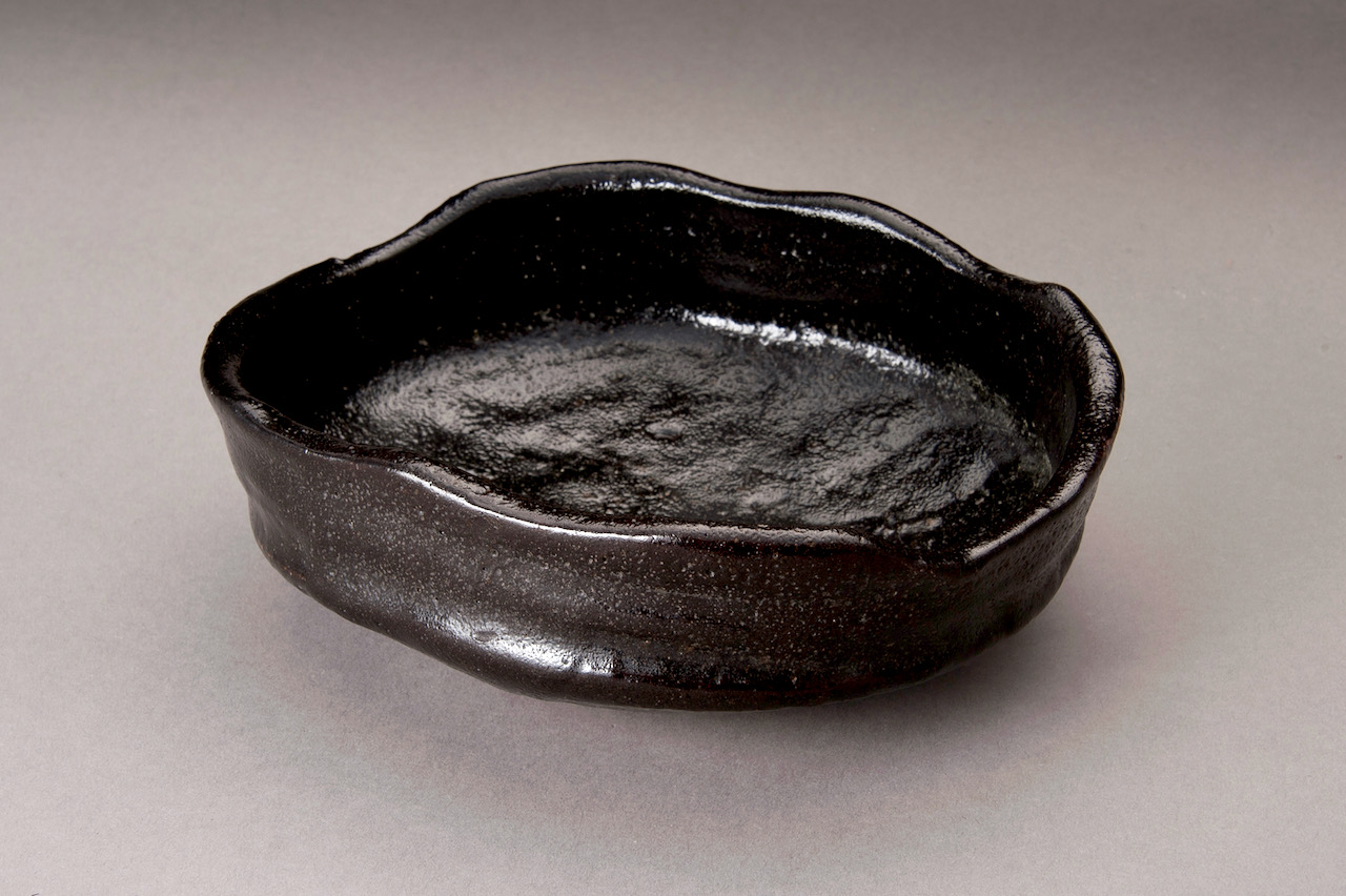 An Edo Period Black Oribe Tea Bowl