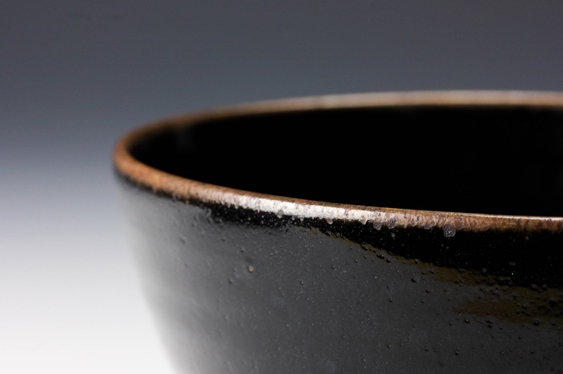 A “Koyo” Tenmoku Tea Bowl with Silk Pouch by Touetsu Kiln