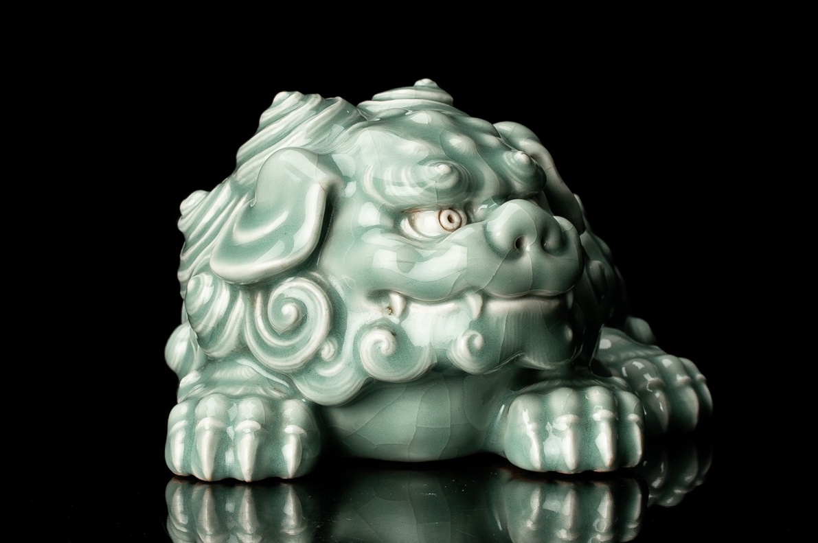 A Celadon Shishi Statue by first generation Miyagawa Kōzan (1842–1916)