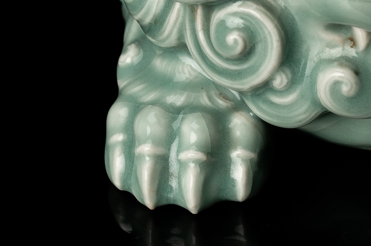 A Celadon Shishi Statue by first generation Miyagawa Kōzan (1842–1916)