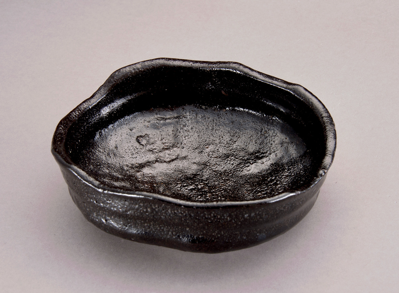 An Edo Period Black Oribe Tea Bowl